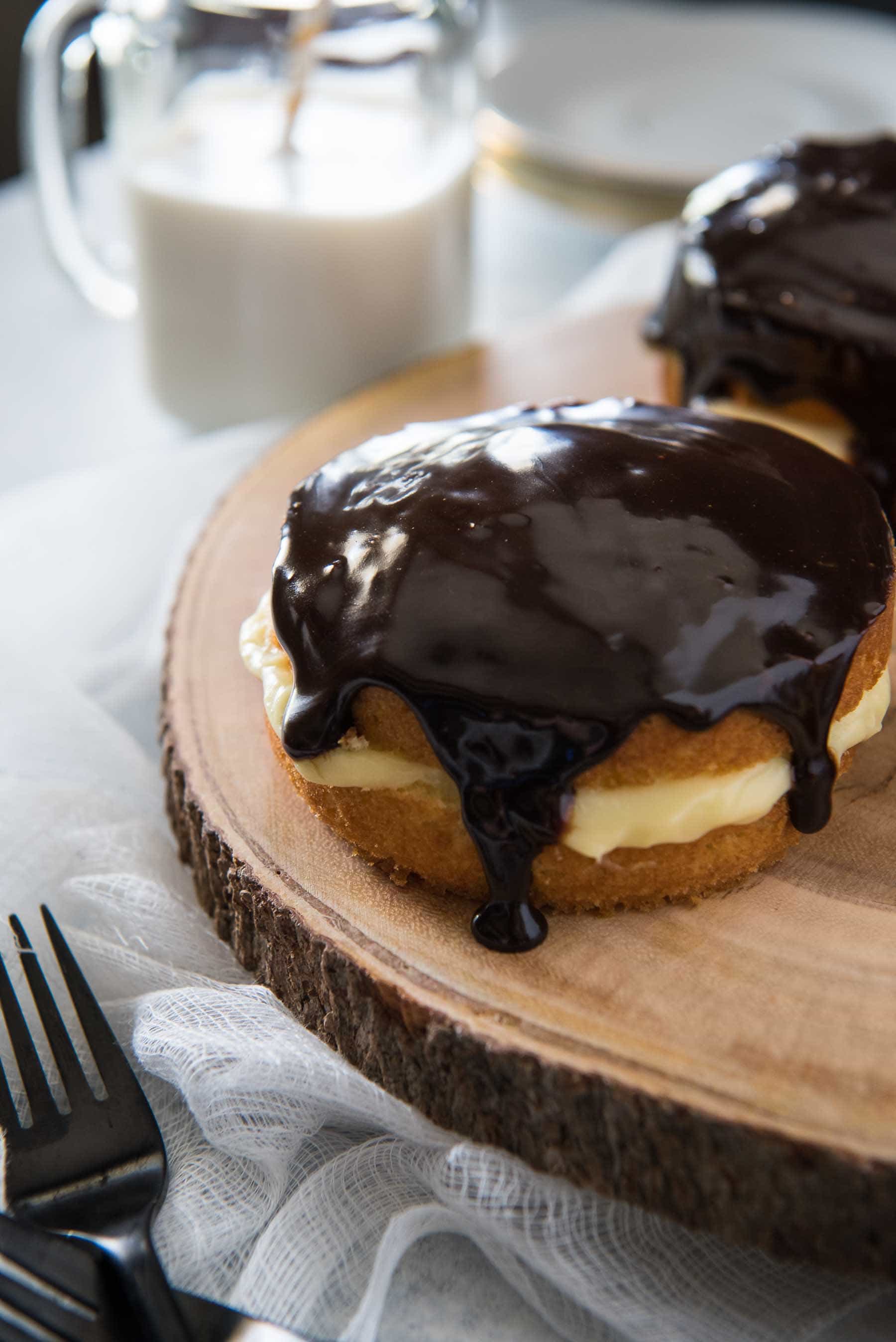 There's nothing quite like a classic Boston Cream Pie...since it's actually a cake! Rich, thick pastry cream is sandwiched between two layers of buttery yellow cake, then topped with a dark chocolate glaze.
