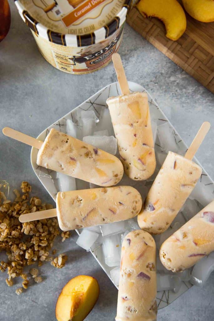  This cool dessert pops! These Caramel Peach Crisp Ice Cream Pops combine the goodness of summer peaches and the fun of a crumbly crisp with rich, creamy, light caramel ice cream.