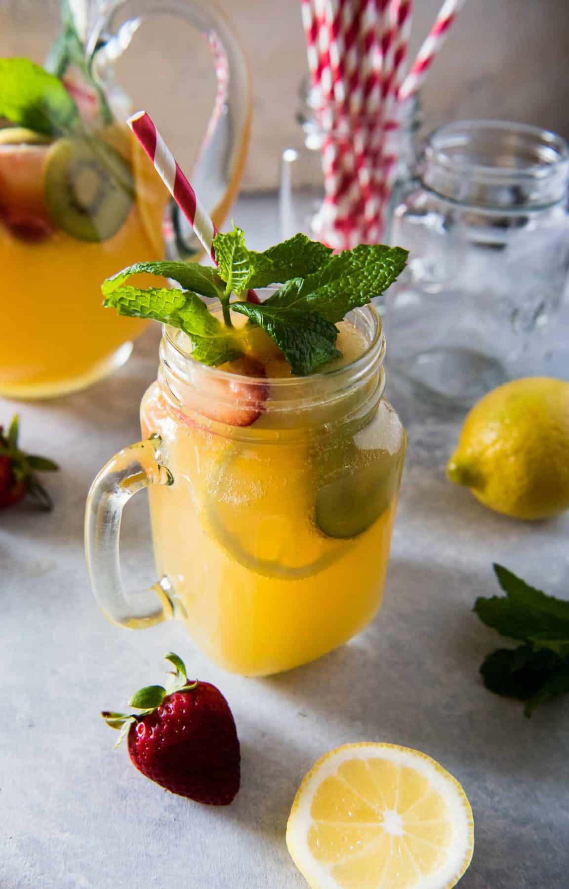  Cool down these hot summer days with a pitcher of Orange Lemonade Twist Punch! Fizzy, spicy, and fruity, this refreshing drink is sure to wow your friends & family!
