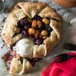 This Cherry Almond Galette is a gorgeous way to show off your favorite summer fruit! A rustic, flaky, sugar-kissed almond pastry, brimming with balsamic glazed cherries...a scoop of ice cream is all you need for a perfect dessert!
