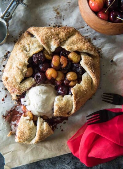 This Cherry Almond Galette is a gorgeous way to show off your favorite summer fruit! A rustic, flaky, sugar-kissed almond pastry, brimming with balsamic glazed cherries...a scoop of ice cream is all you need for a perfect dessert!