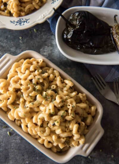Fresh jalapenos heat up this Instant Pot Mac and Cheese with Roasted Poblanos - but delicious, creamy layers of cheese cool it all down, making this side dish perfect for all ages & palates! 