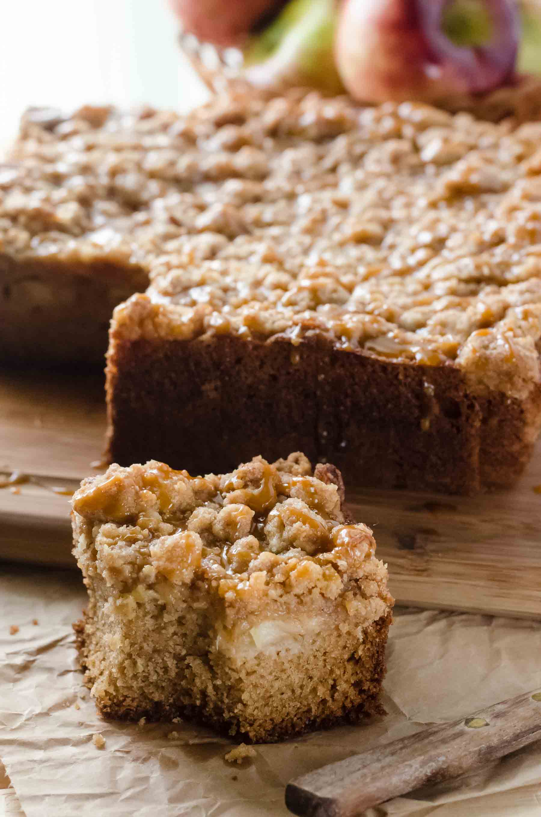 Classic crumb cake with an autumn twist! This sweet Apple Butterscotch Crumb Cake is loaded with apples, then drizzled with homemade butterscotch sauce that you're going to want to put on everything!