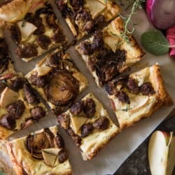 Caramelized onions, spicy Italian sausage, and sweet apple on an herbed ricotta, spread over puff pastry - whether served as an appetizer or snack, this Savory Apple Sausage Tart is sure to please any fall flavor-loving crowd! 