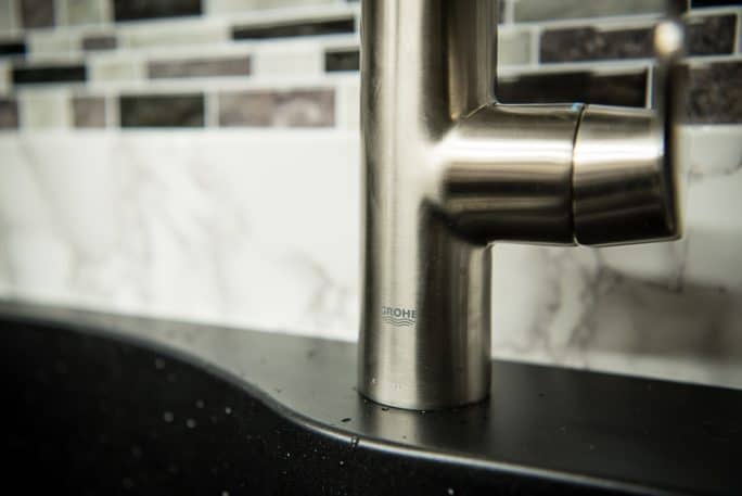Welcome to The Crumby Kitchen Remodel Part One: Meet Our New Faucet! We're updating our dated '80s Formica kitchen into something modern and bright!
