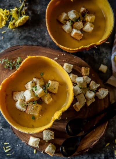 This rich and creamy Pumpkin Beer Cheese Soup gets the seasonal treatment, and the homemade herbed croutons add a happy crunch to this satisfyingly easy meal!