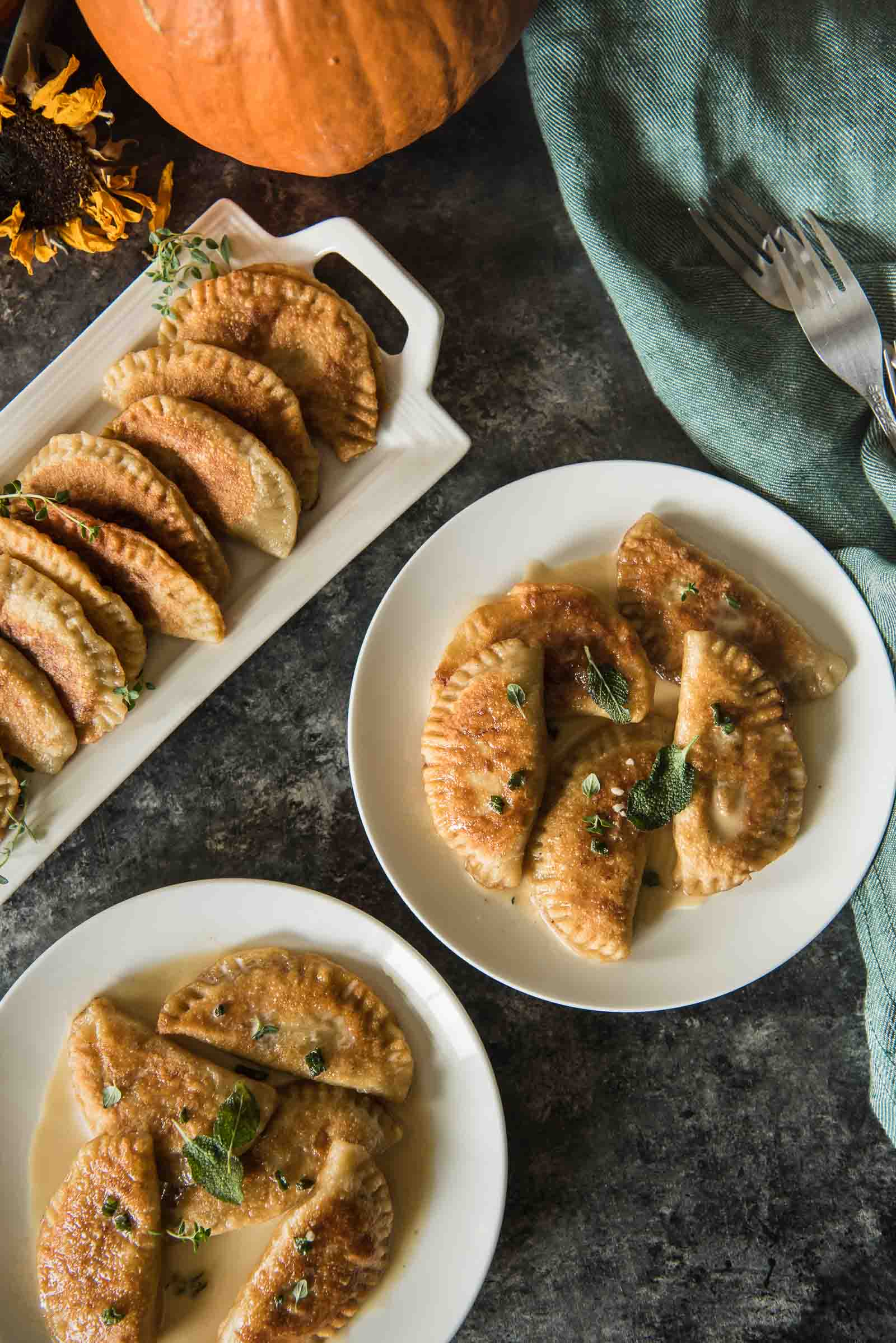 A seasonal take on Nana's Polish dumplings, these Pumpkin Walnut Sage Pierogi are extra delicious when paired with a brown butter cream sauce! 