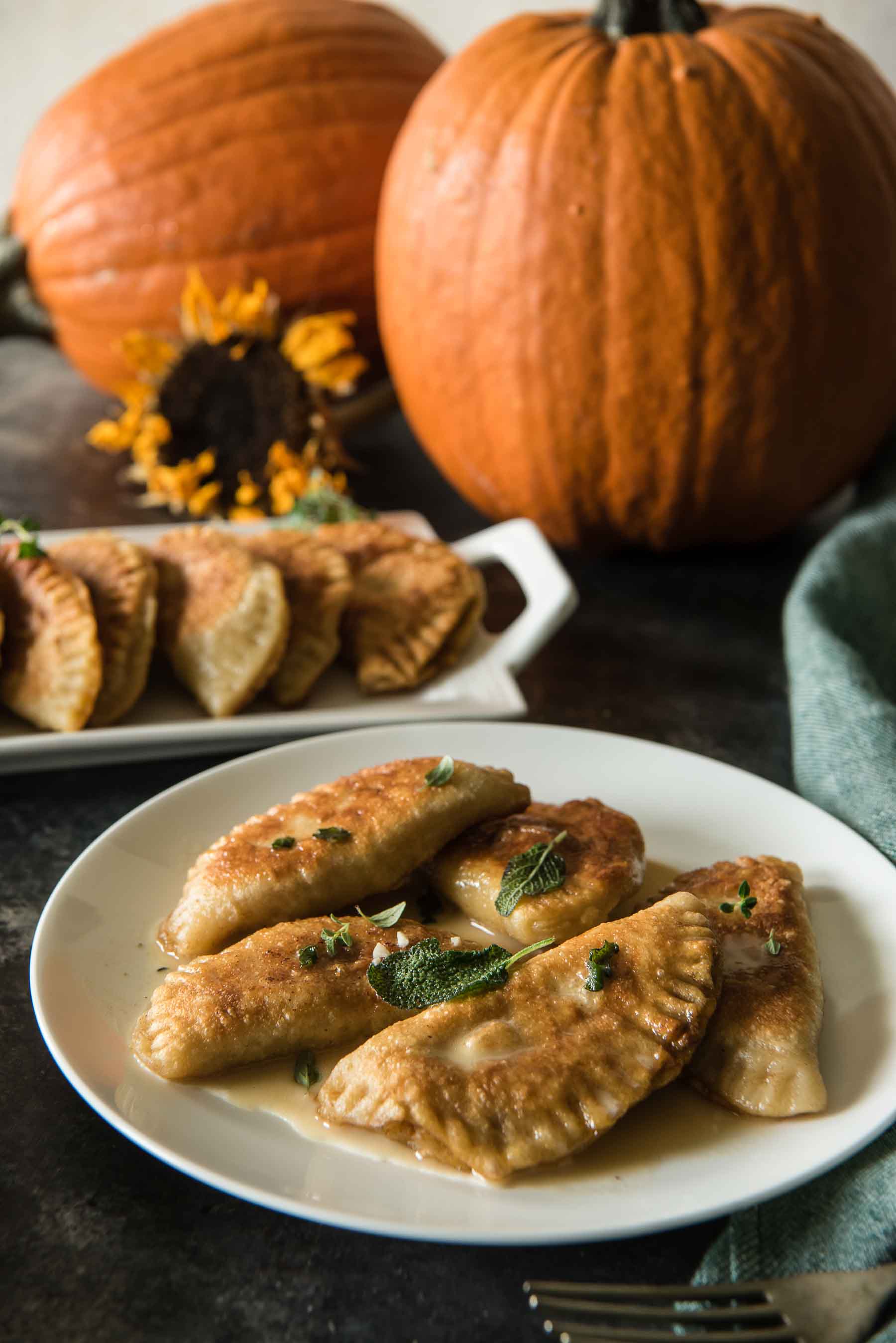 A seasonal take on Nana's Polish dumplings, these Pumpkin Walnut Sage Pierogi are extra delicious when paired with a brown butter cream sauce! 