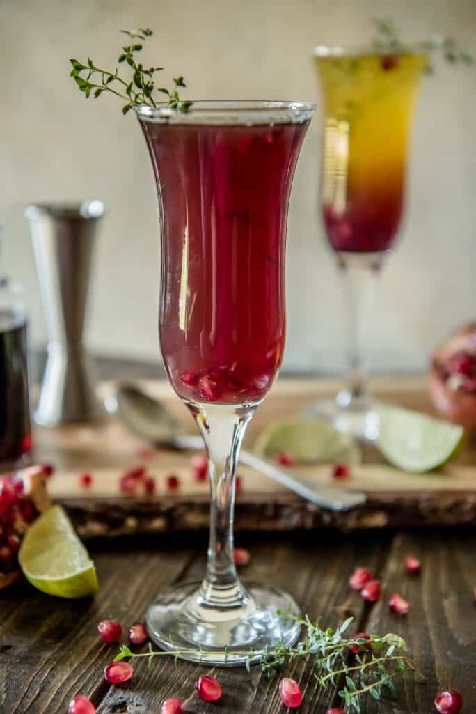 Passion fruit, pineapple, and pomegranate make this fiery Southern Autumn Sunrise Cocktail as welcome on a cool day as it is on a hot day!