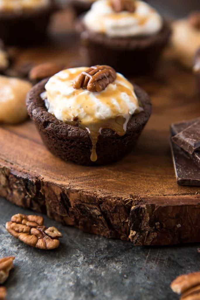 Chocolate Turtle Pie Cookie Cups with caramel drips
