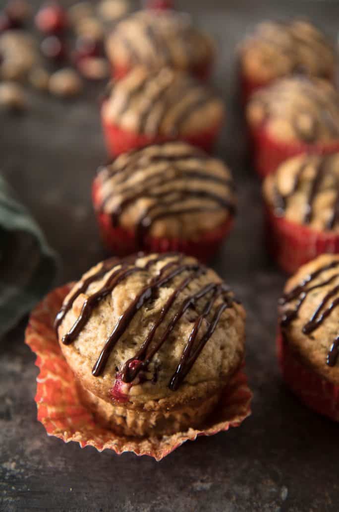 Banana Cranberry Pistachio Muffins with Chocolate Glaze