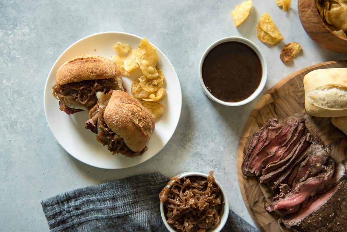 French Dip Sandwiches with Caramelized Onion Au Jus • The Crumby Kitchen