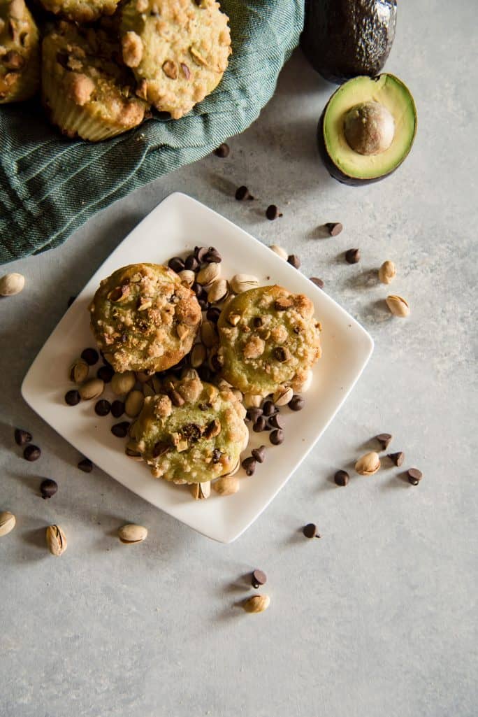 Topview of Avocado Chocolate Chip Muffins with Pistachio Crumble