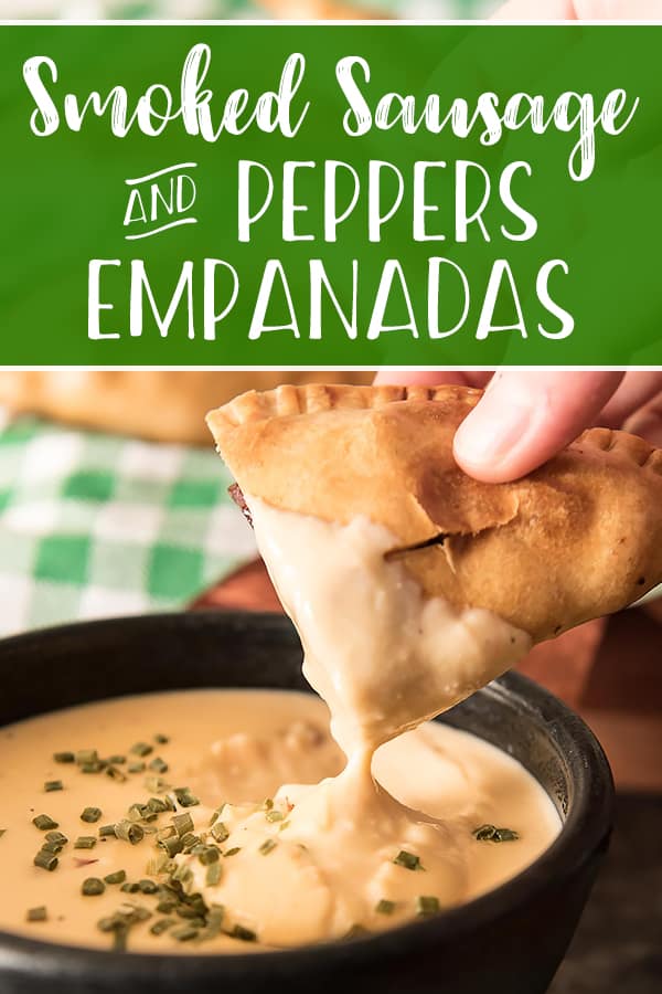 A fabulous street food mash-up served with a gooey beer cheese dip! Delicious smoked sausage, peppers, and onions, stuffed in pastry discs make these Smoked Sausage and Peppers Empanadas perfectly portable and mess free!