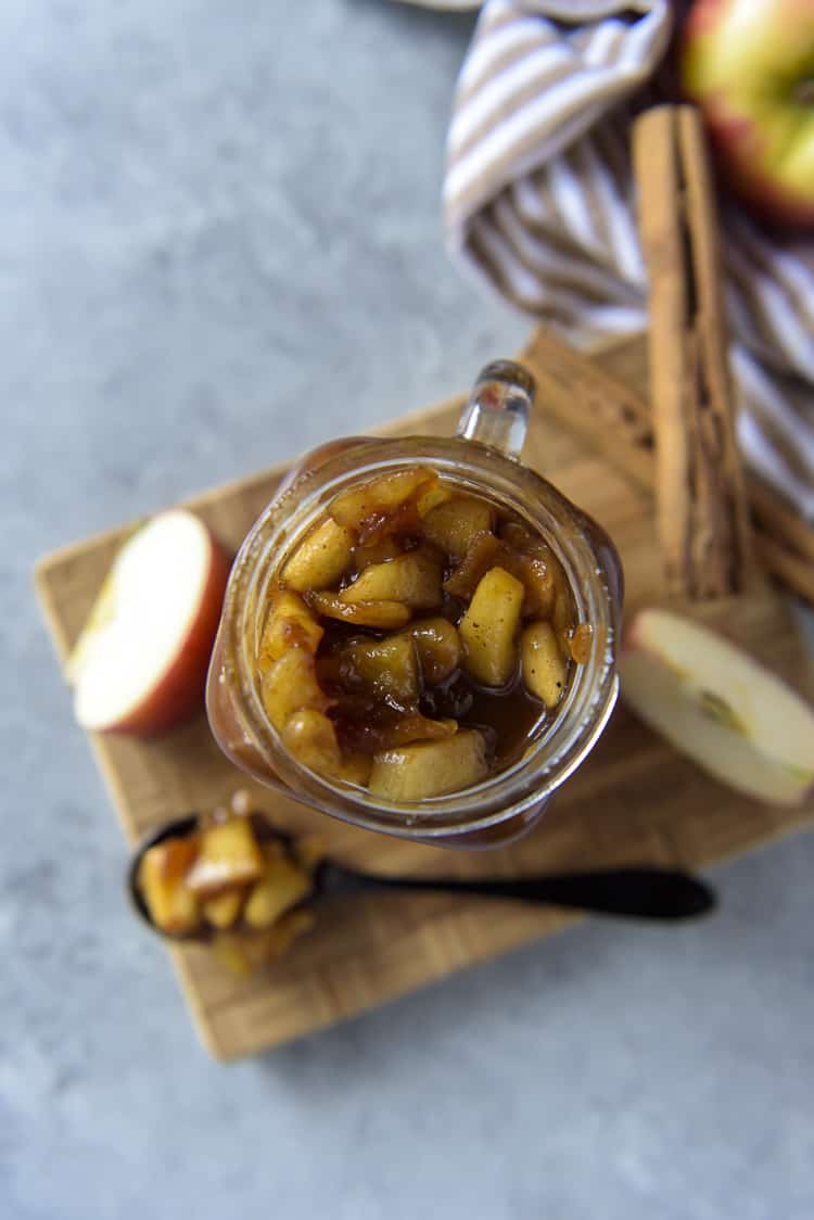 Apple Pie Filling recipe in a jar with a spoon