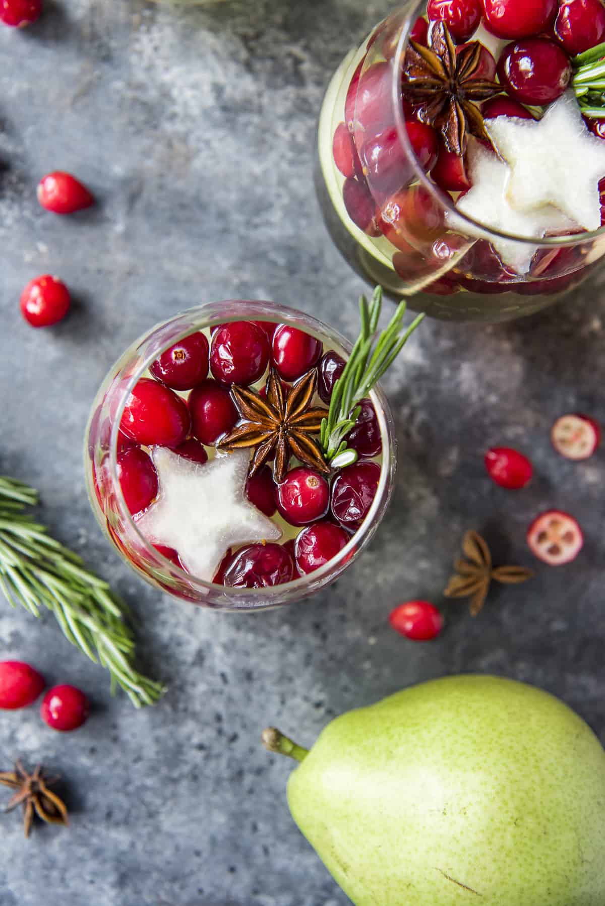 a top down view of a glass of white Christmas sangria