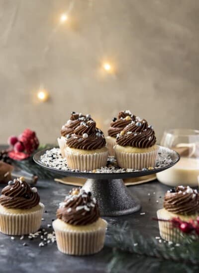 Chocolate Eggnog Cupcakes on a cake stand