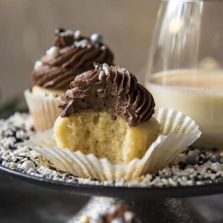 Chocolate Eggnog Cupcakes with a bite taken out of one