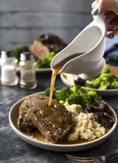 Pouring gravy over Slow Cooker Meatloaf