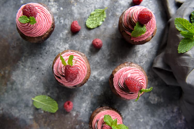 A flatlay photo of Chocolate Raspberry Cupcakes