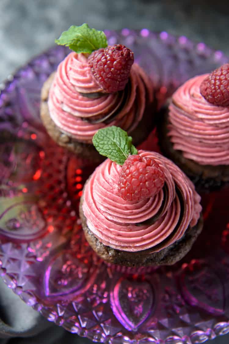 Chocolate Raspberry Cupcakes on a cake plate