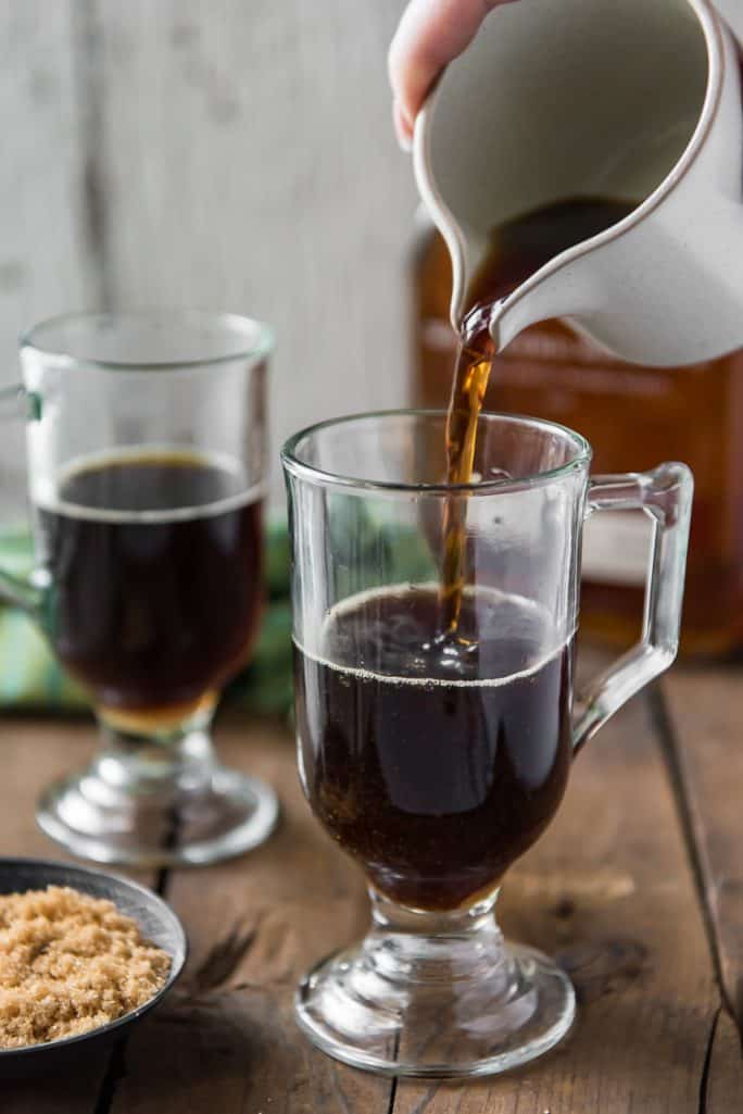 Pouring coffee into a mug for a Classic Irish Coffee