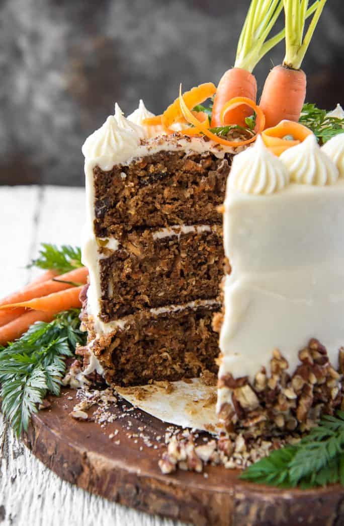 Buttermilk Carrot Cake with a slice cut out of it