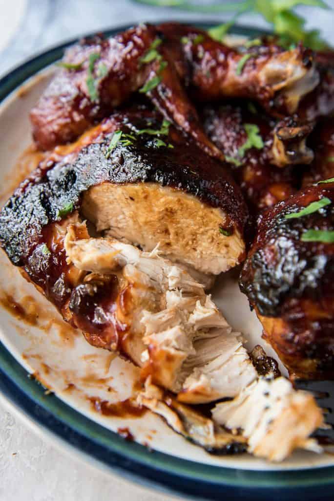Moist, brined BBQ Baked Chicken on a plate