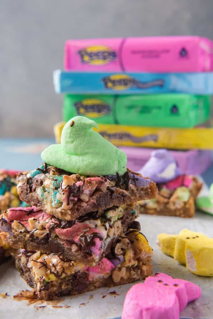 A stack of Springtime Rocky Road Blondies with a PEEP on top