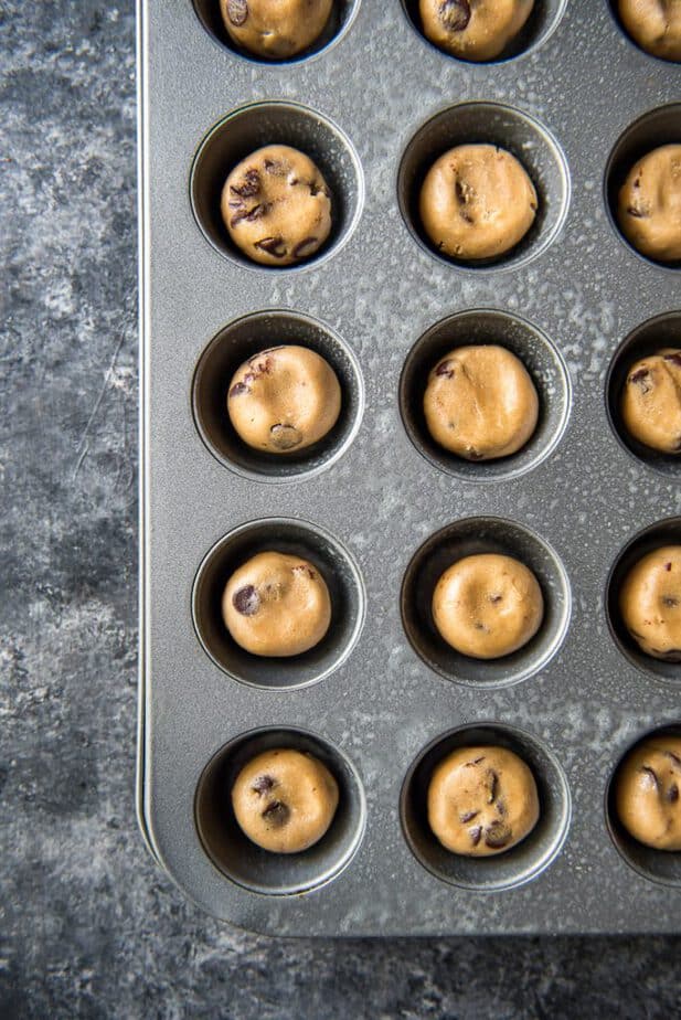 Cookie dough balls in a muffin tin - Cannoli Cookie Cups