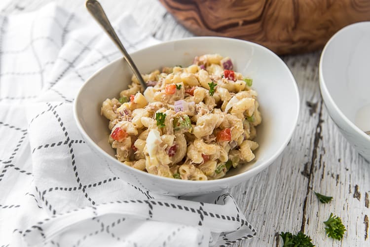 Easy Tuna Macaroni Salad in a white bowl with a fork in it