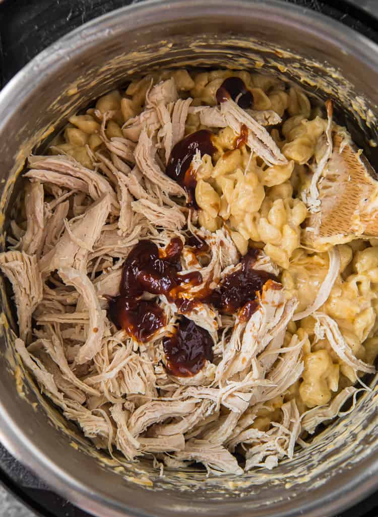 cheesy pasta, shredded chicken, and barbecue sauce in an instant pot