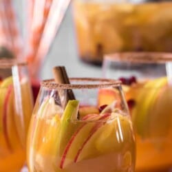 closeup of wine glasses filled with pumpkin sangria