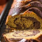 sliced swirl chocolate pumpkin bread with bourbon glaze drips