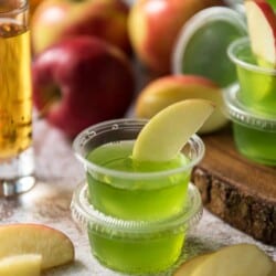 a stack of apple jello shots