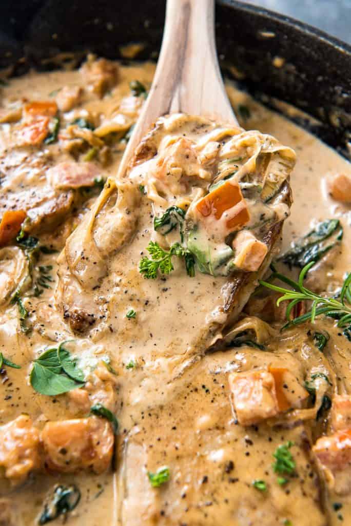 Easy Tuscan Smothered Pork Chops • The Crumby Kitchen