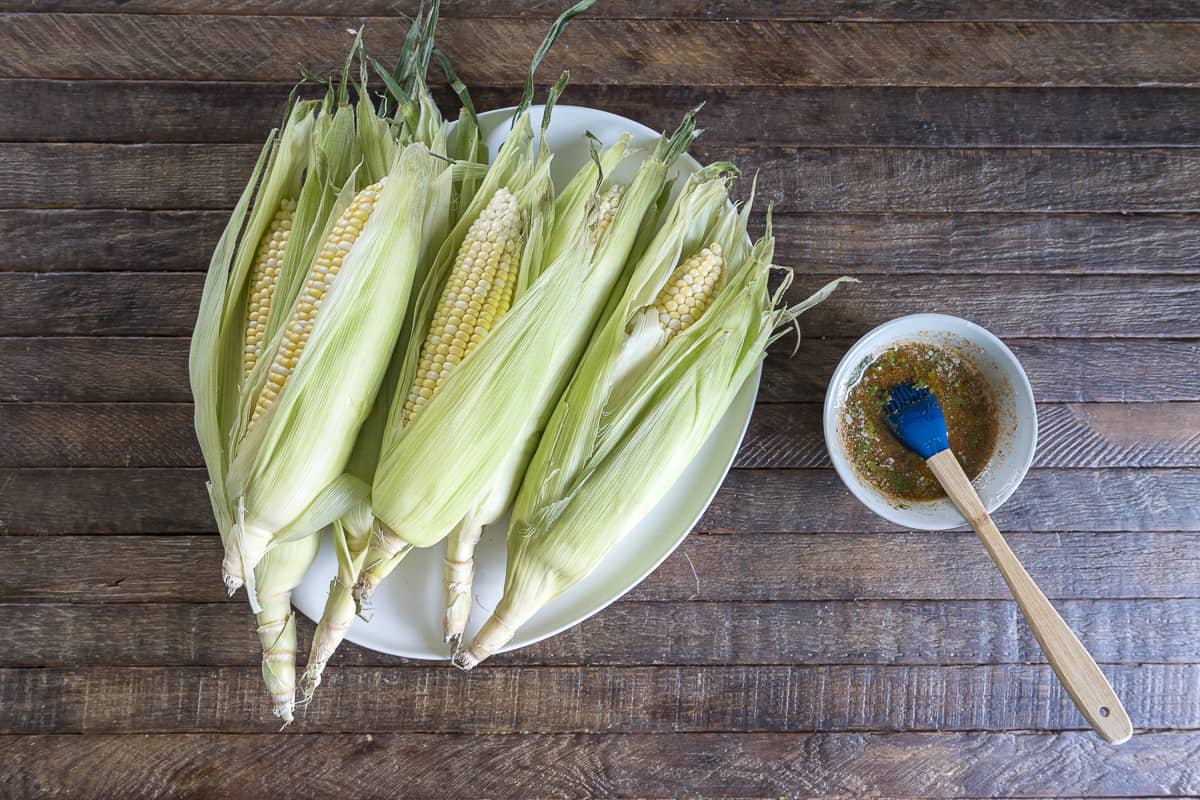 instructional photos for making smoked corn on the cob