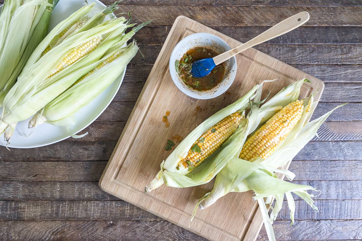 instructional photos for making smoked corn on the cob