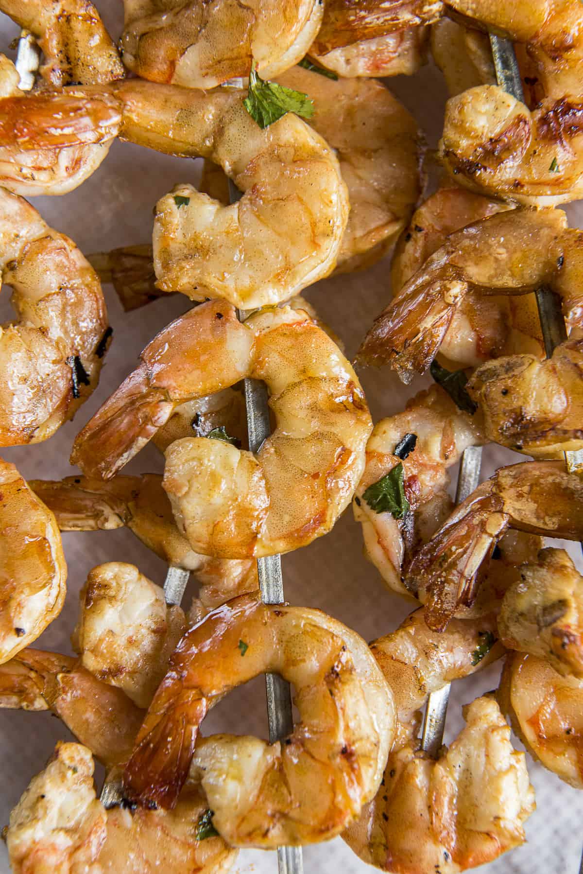 shrimp on skewers after being smoked on a pellet grill